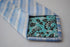 blue and white check design tie